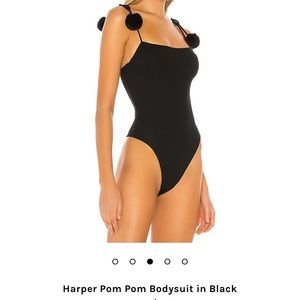 Ballet pink/blush bodysuit with Pom poms